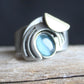Christophe Poly Rings Curves over Turquoise - Brainchild Designs